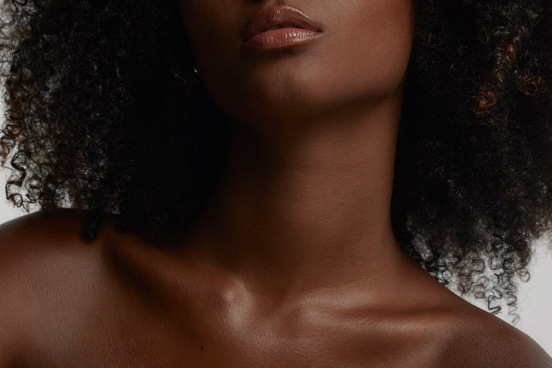 close-up-womans-chin-decolletage